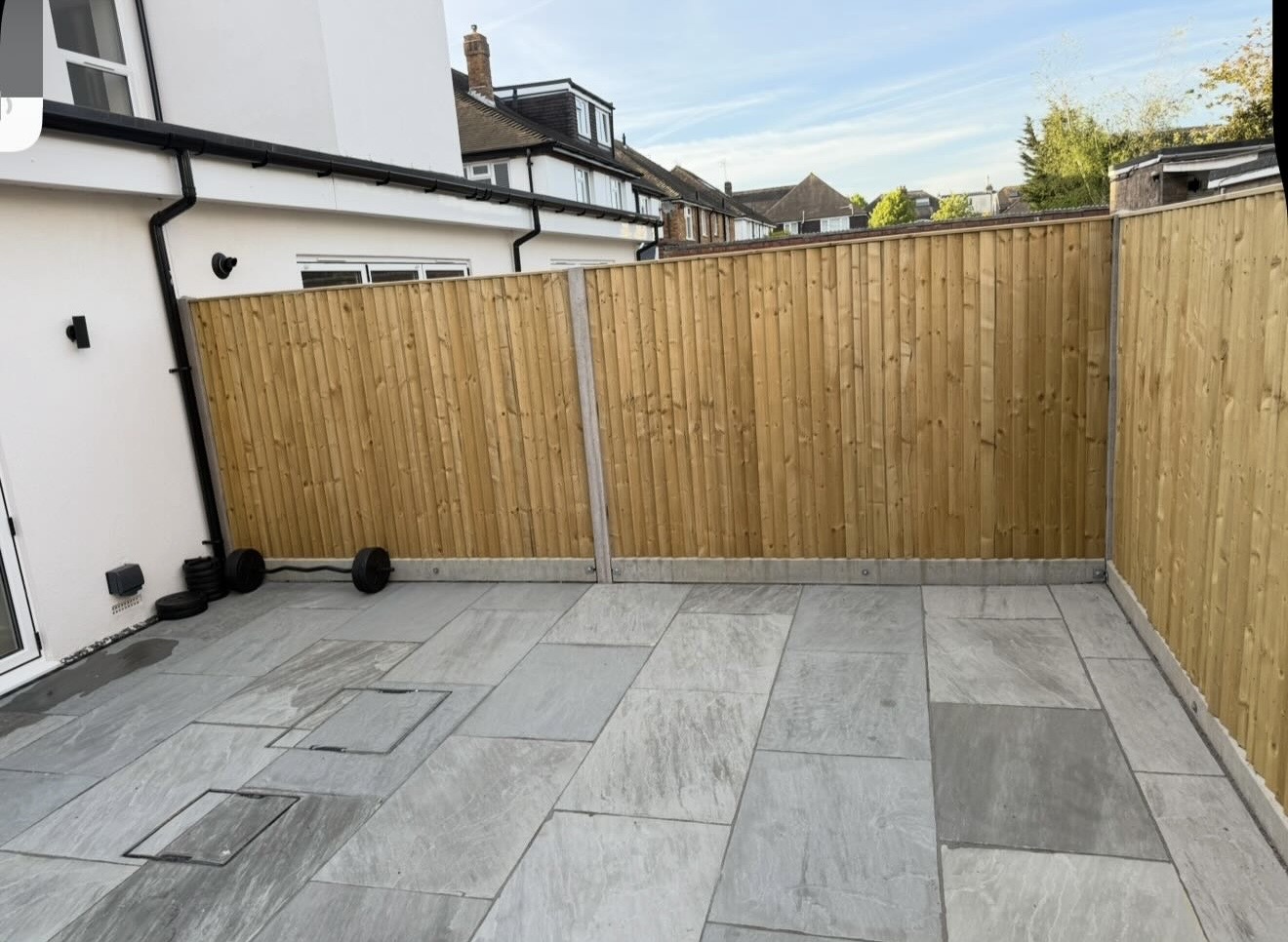 Clean patio area after clearance