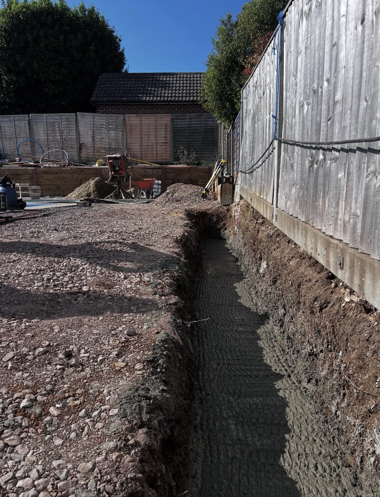 Dug footings with concrete for groundwork project